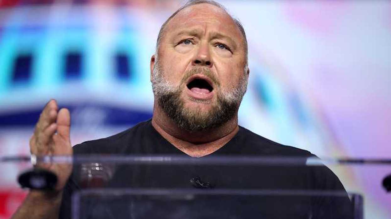 Alex Jones speaking with attendees at The People's Convention at Huntington Place in Detroit, Michigan.