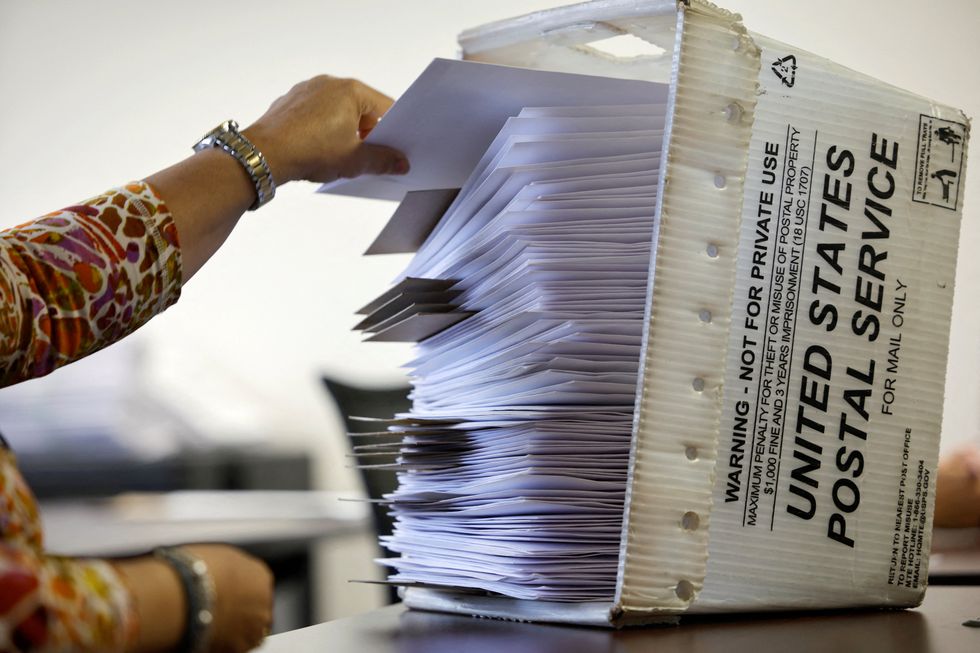 Trump FBI chief sends agents to Wisconsin election officials’ homes