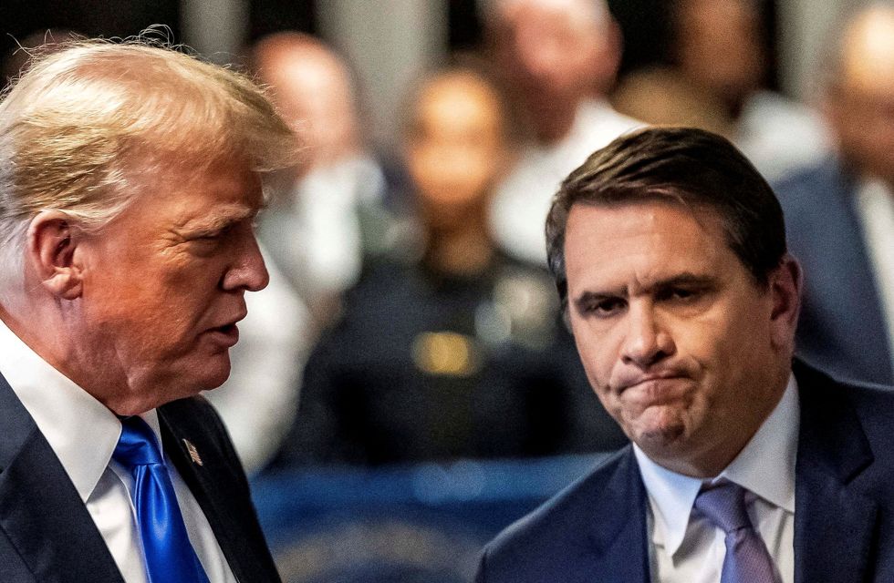 Trump handed AG a stack of articles labeled 'treason' — and now DOJ is targeting reporters