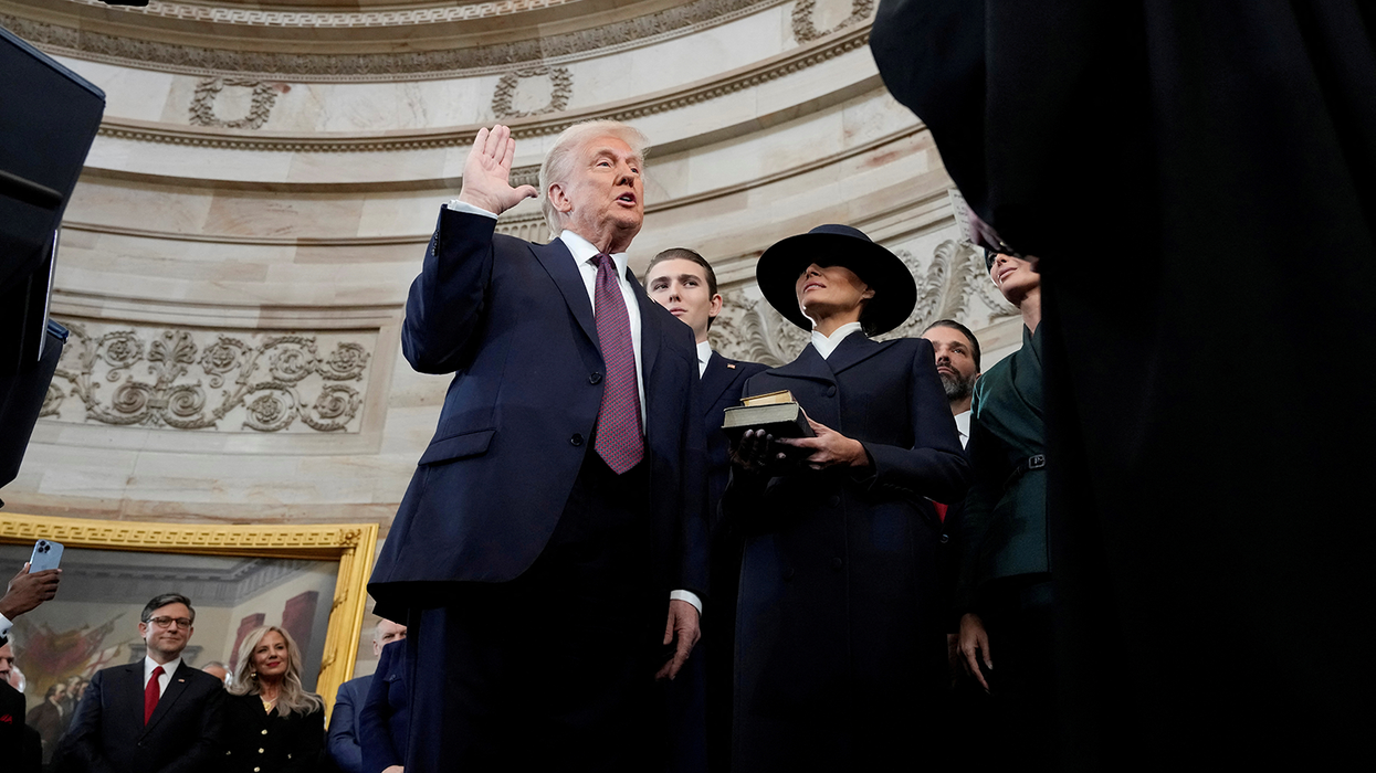 Skipping hand on Bible, Trump declares 'we will not forget our God' at inauguration