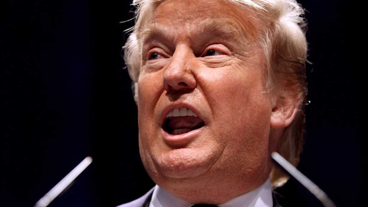 Former staffer mocks 'coward' Trump with photo of him hiding in a catering cart