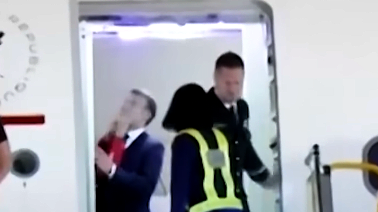 Stunning video shows Macron’s wife shoving his face — but officials say it’s 'playful teasing'