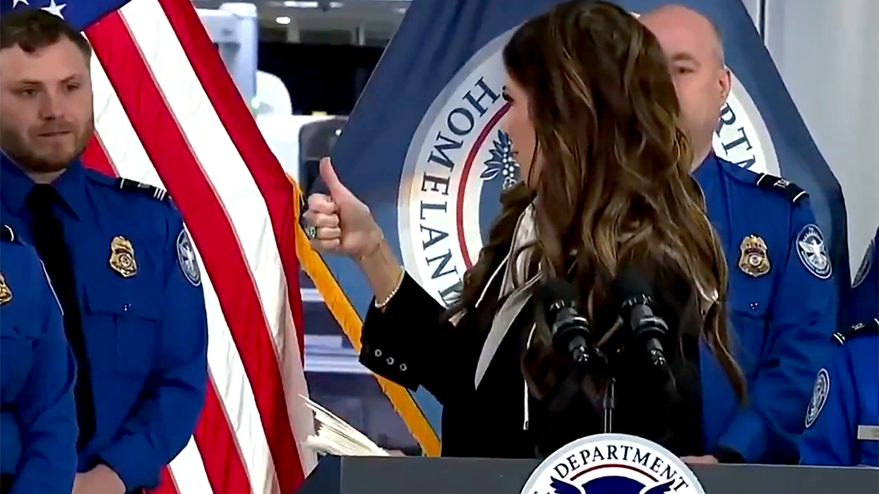 Kristi Noem hands out 'fake' checks to TSA agents