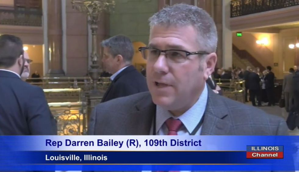 ‘Callous disregard for life’: Far-right Illinois Republican thrown out of legislative session for refusing to wear a mask