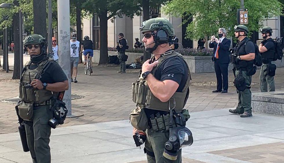 'Department of Justice' deploys rogue force of unidentified armed militia to patrol DC