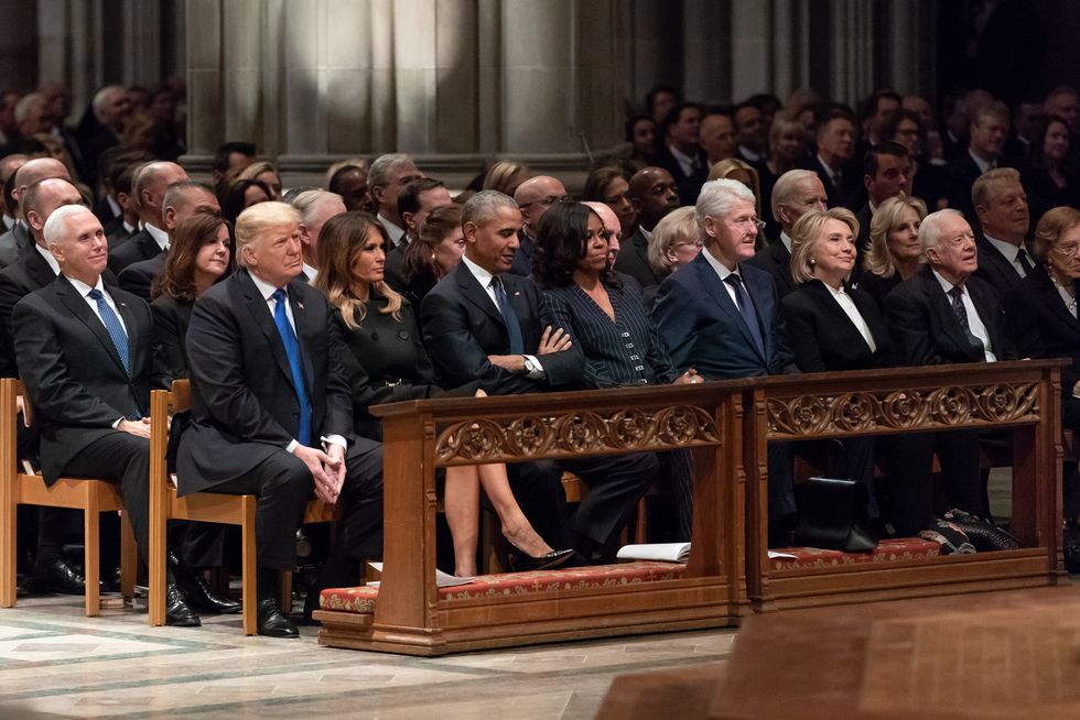Trump fumed about sharing the spotlight with Bush Sr.  -  but was proud of his behavior at funeral: report