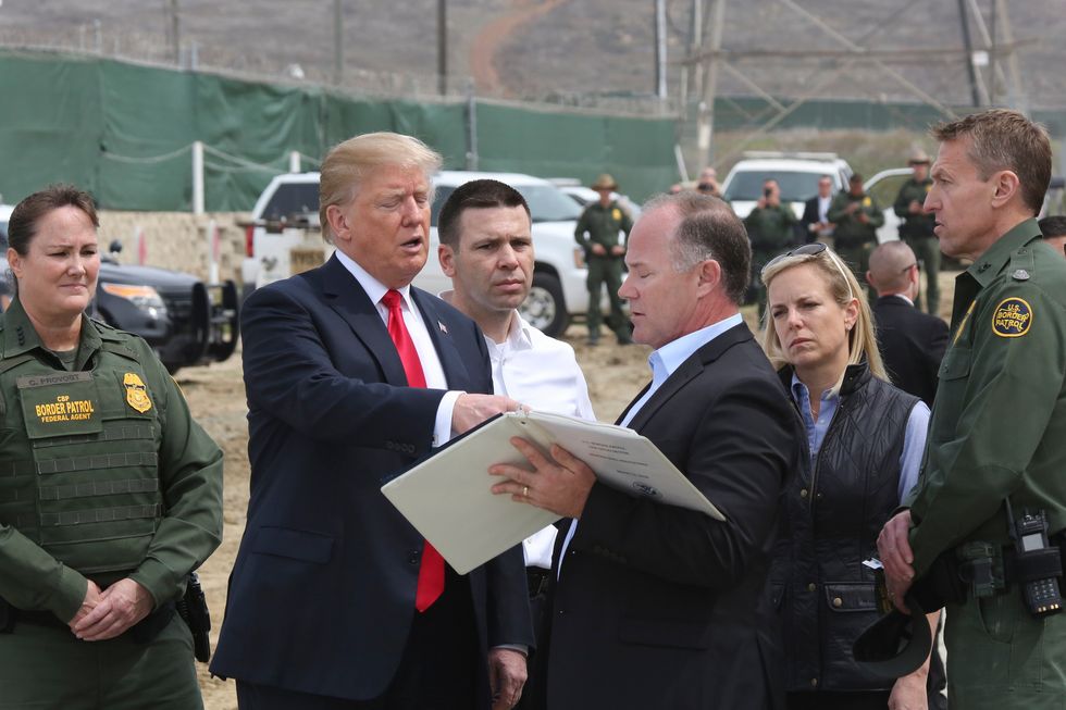 Trump's feeble fight for a border wall has sparked feuds among White House aides as his major promise becomes a pipe dream: report