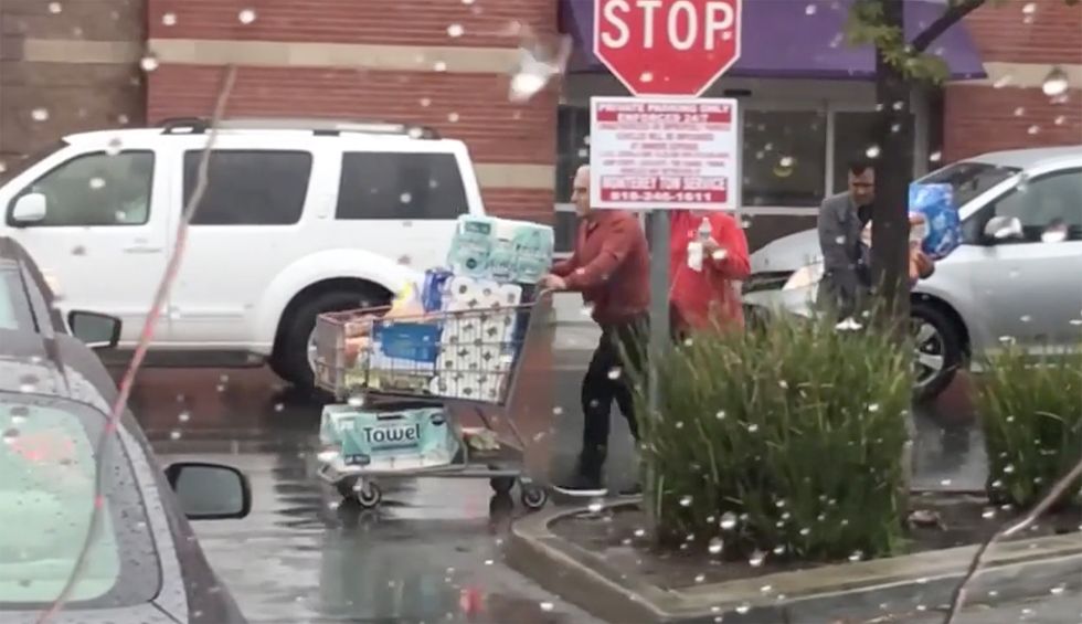 Shocking video captures Trump supporter buying Dollar Tree store out of toilet paper during coronavirus crisis