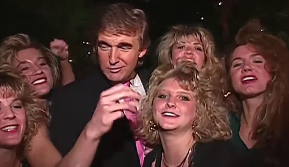 Newly revealed video shows Trump and Jeffrey Epstein ogling cheerleaders at Mar-a-Lago party