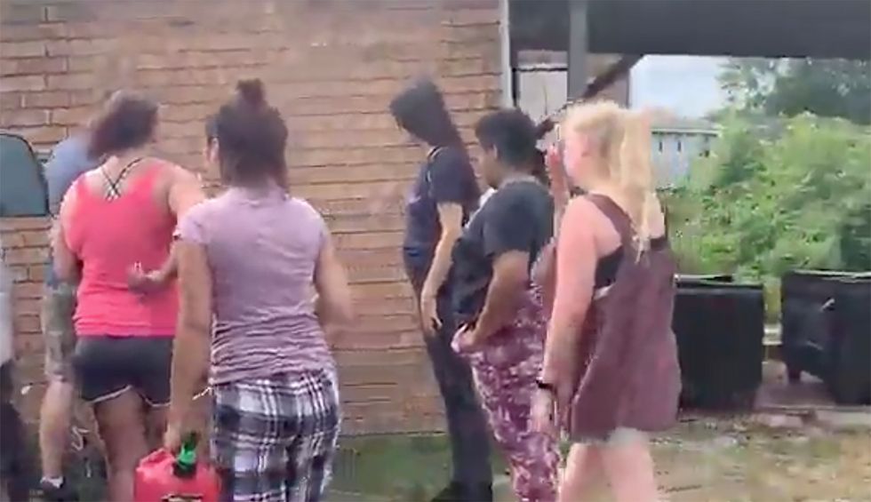 Neighbors in Nashville suburb form human chain to prevent ICE from taking man into custody