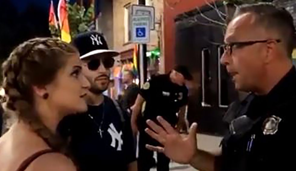 WATCH: Cop goes viral after calmly shutting down Trump-loving 'Gun Girl' with some simple logic