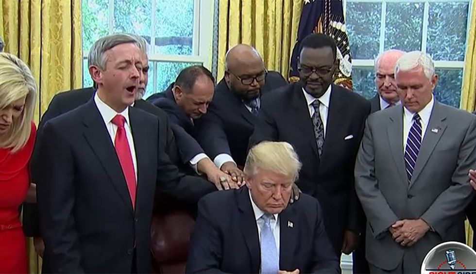Christian leaders lay hands on and pray for Donald Trump ahead of impeachment vote