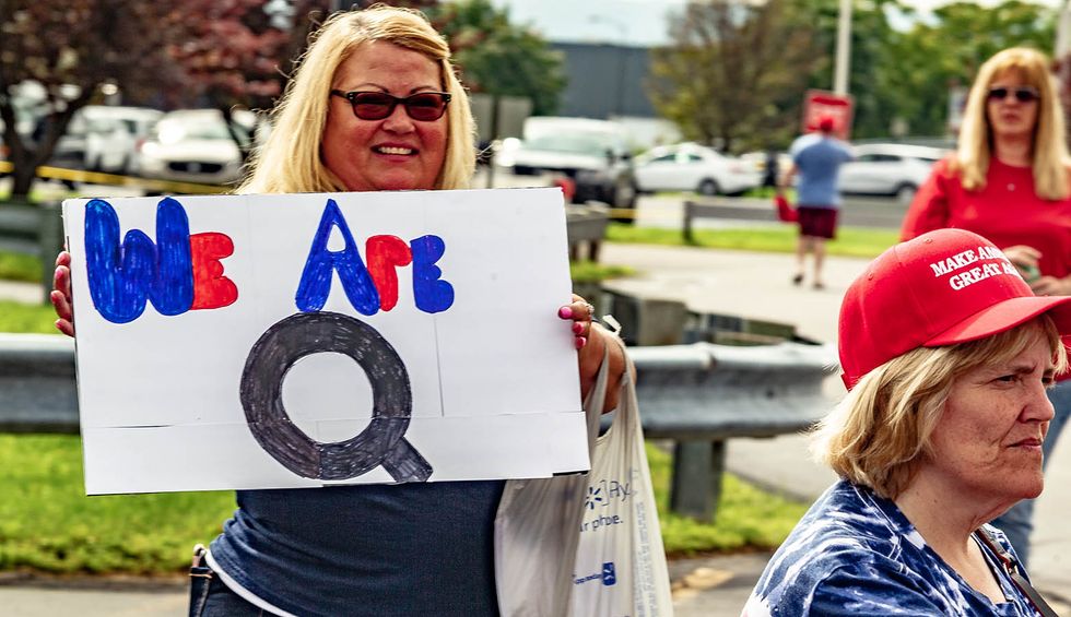 A news outlet argues QAnon has gone beyond a 'conspiracy theory' — it's now a 'collective delusion'