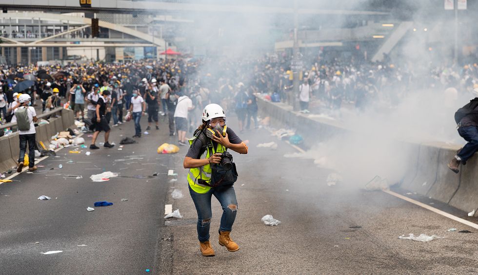 Hong Kong protests and Brexit could both end up benefiting financial elites — here's how