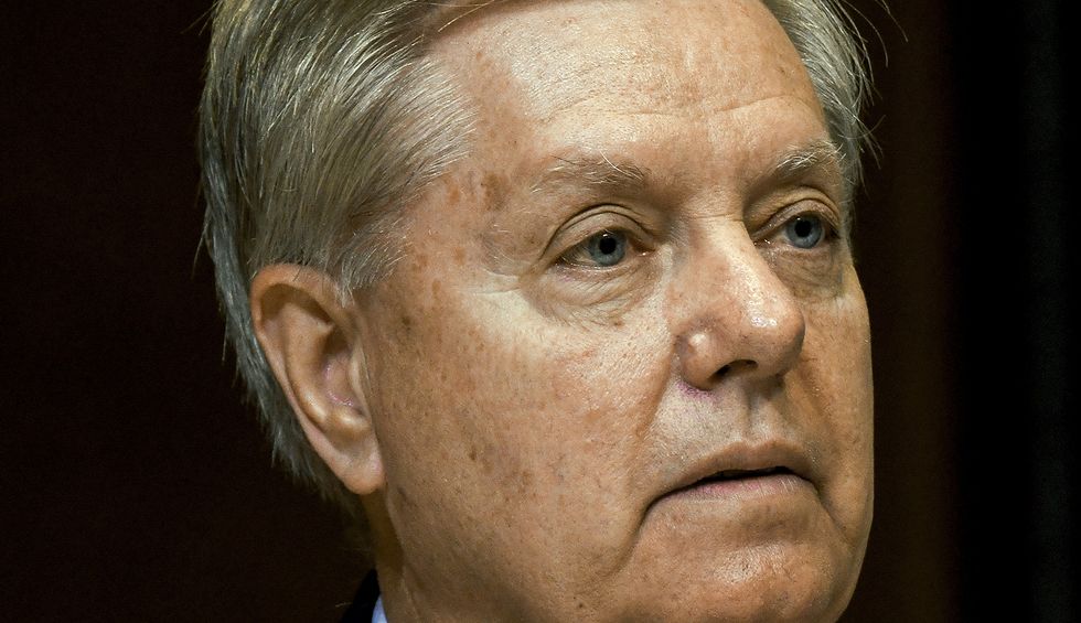 Internet shreds 'sycophant' Lindsey Graham for enabling Trump after senator threatens resolution against Syria pullout