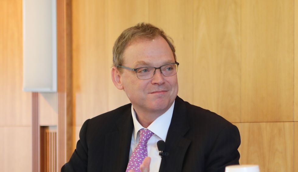 A top White House economic adviser is leaving — and he has a disturbing warning on his way out