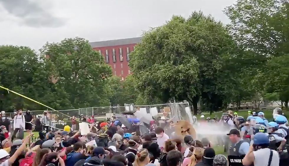 Secret Service forces press to leave White House as police use hoses, pepper spray and batons to beat back protesters