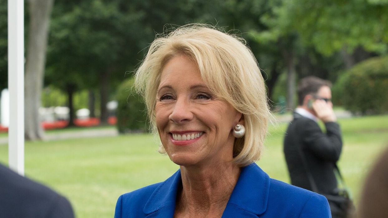Betsy DeVos is back — and her family is flooding Florida Gov. Ron DeSantis with cash