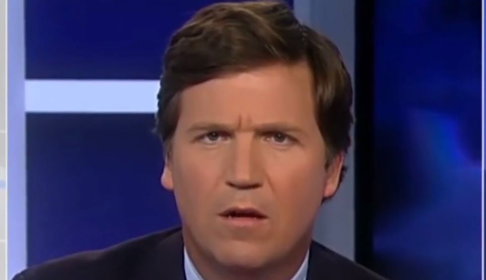 Tucker Carlson attacks Michelle Obama and says she's trying to 'destroy' American democracy