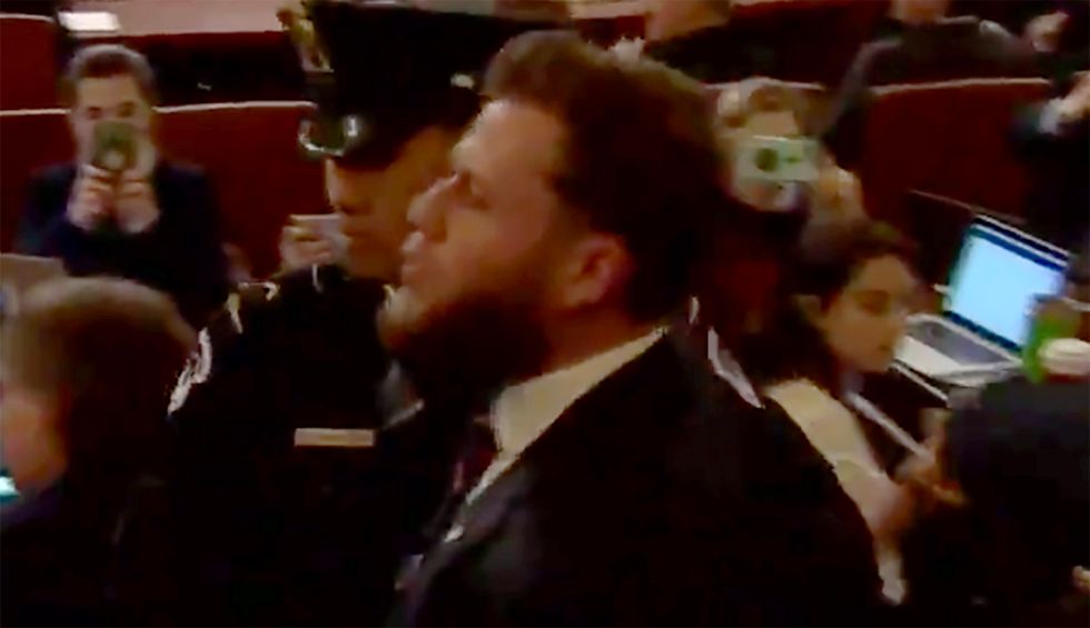 Internet mocks InfoWars protestor who interrupted impeachment hearing to scream ‘Trump is innocent!’
