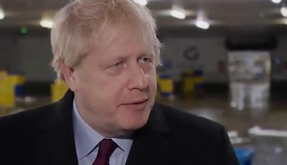 Watch: Boris Johnson refuses to look at sick boy lying on hospital floor due to NHS bed shortage