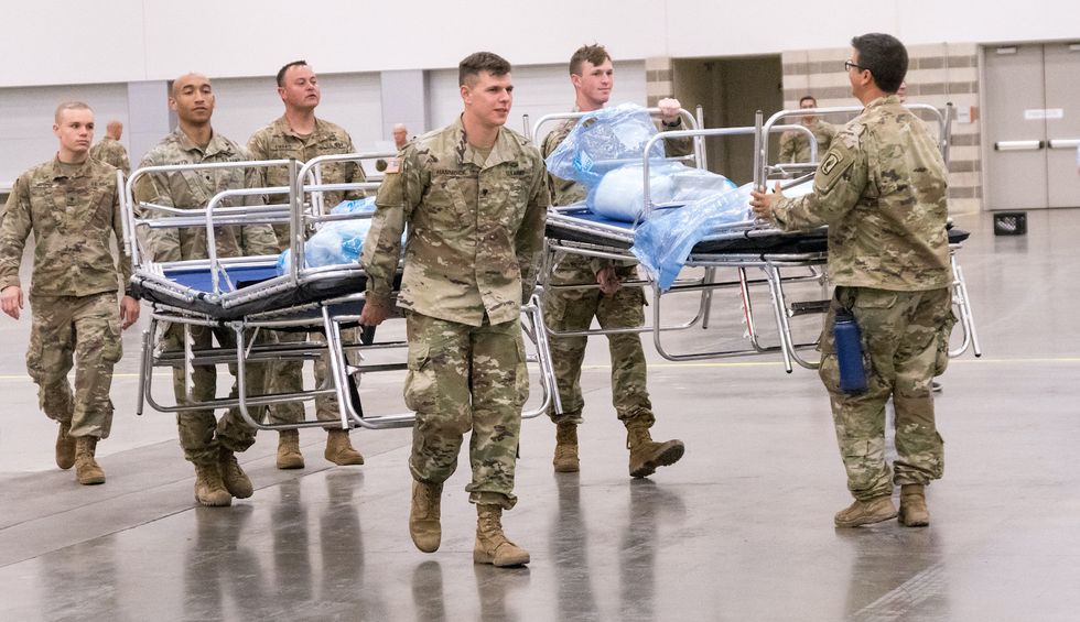 White House instructs governors to send National Guard to hospitals to oversee data on COVID-19