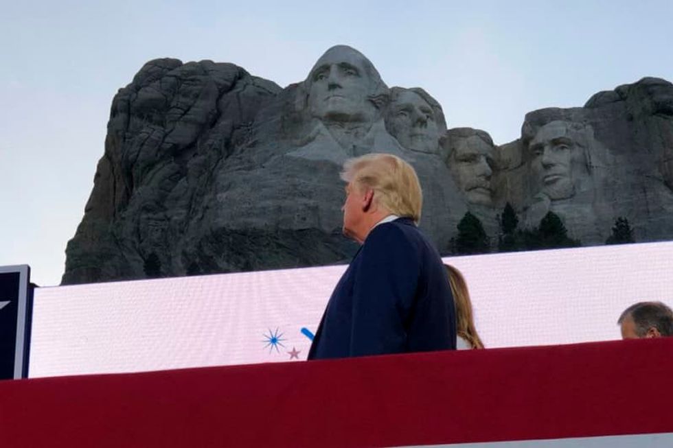 Trump pushes racial division and flouts virus rules at Mount Rushmore