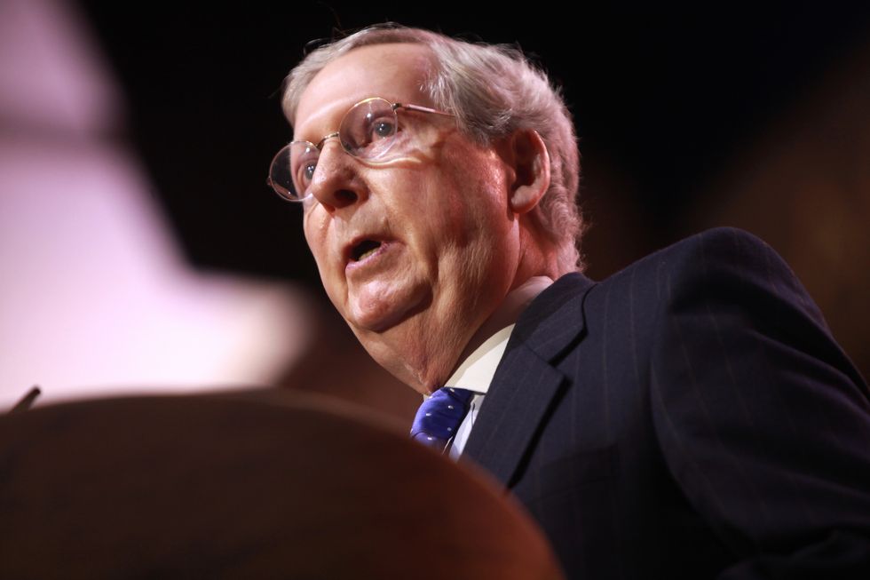 Mitch McConnell is inviting Putin to hack our next election