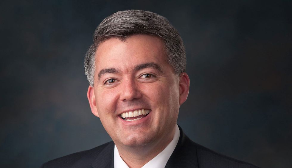 GOP Sen. Cory Gardner attends maskless gun range BBQ with Republican official in 'Kill em all' shirt