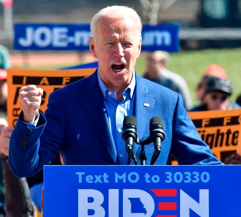Joe Biden talks health care, gun control over sound of protesters at St. Louis event