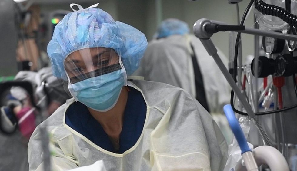 'Heartbreaking': Global experts alarmed at signs US has 'given up' fight to stop COVID-19