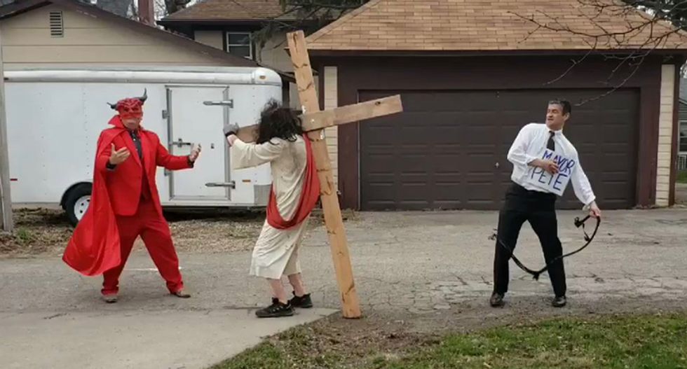Right-wing Christians stage bizarre protest by dressing up as Pete Buttigieg and whipping Jesus