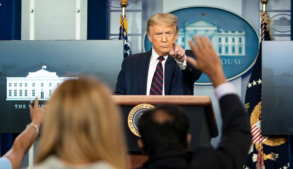 'Trump is scared': 7 states weigh legal challenges to the president's Postal Service attacks