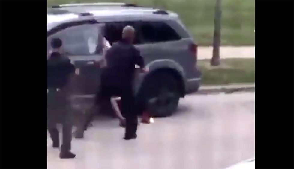 Protests break out in Wisconsin after police shoot Black man in the back at point-blank range as kids watch from car