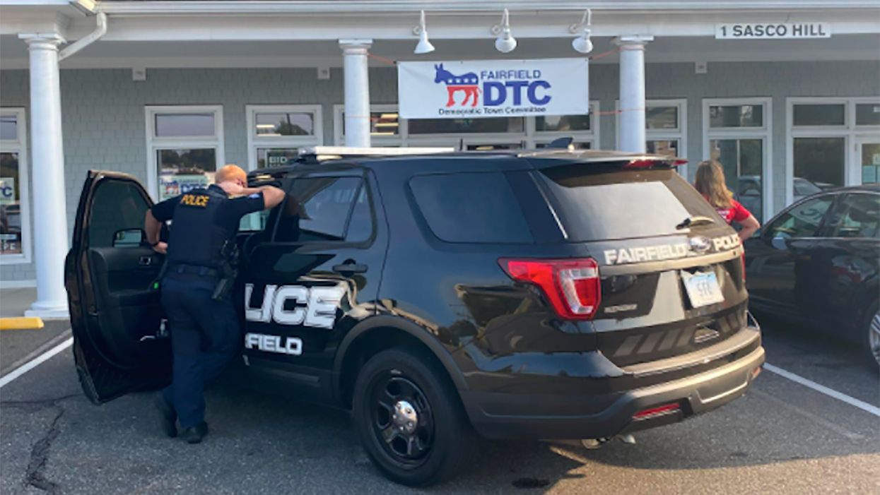 Trump-loving chiropractor loses it after seeing Biden-Harris signs at Democratic campaign office