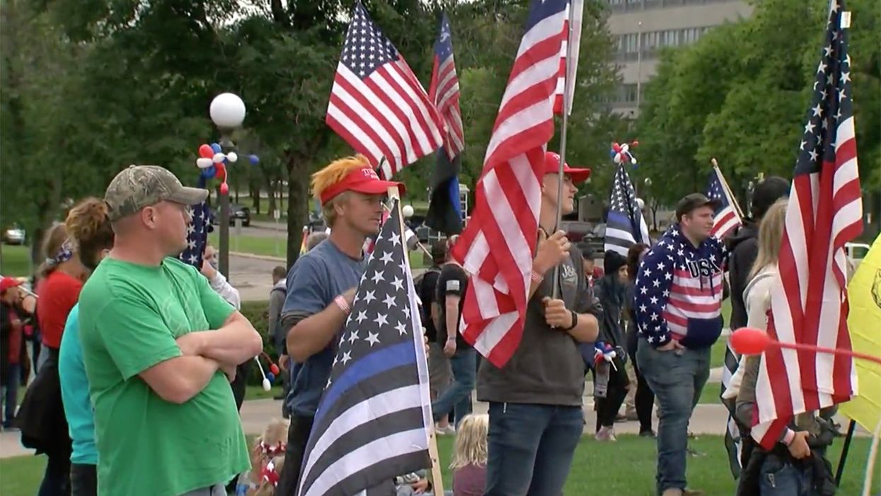 Experts warn of danger posed by armed pro-Trump poll watchers