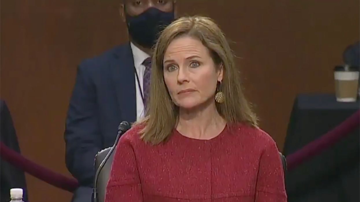 Barrett refuses to say if she thinks landmark abortion law should be overturned – but hints it could be