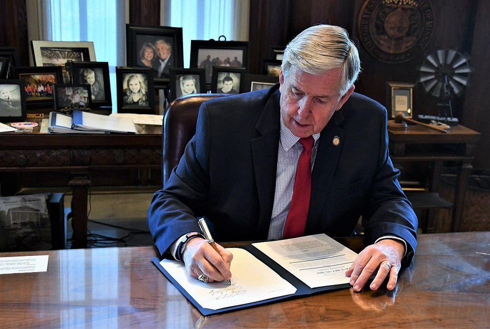 Missouri's GOP governor attacked mask mandates — and concealed evidence that they work