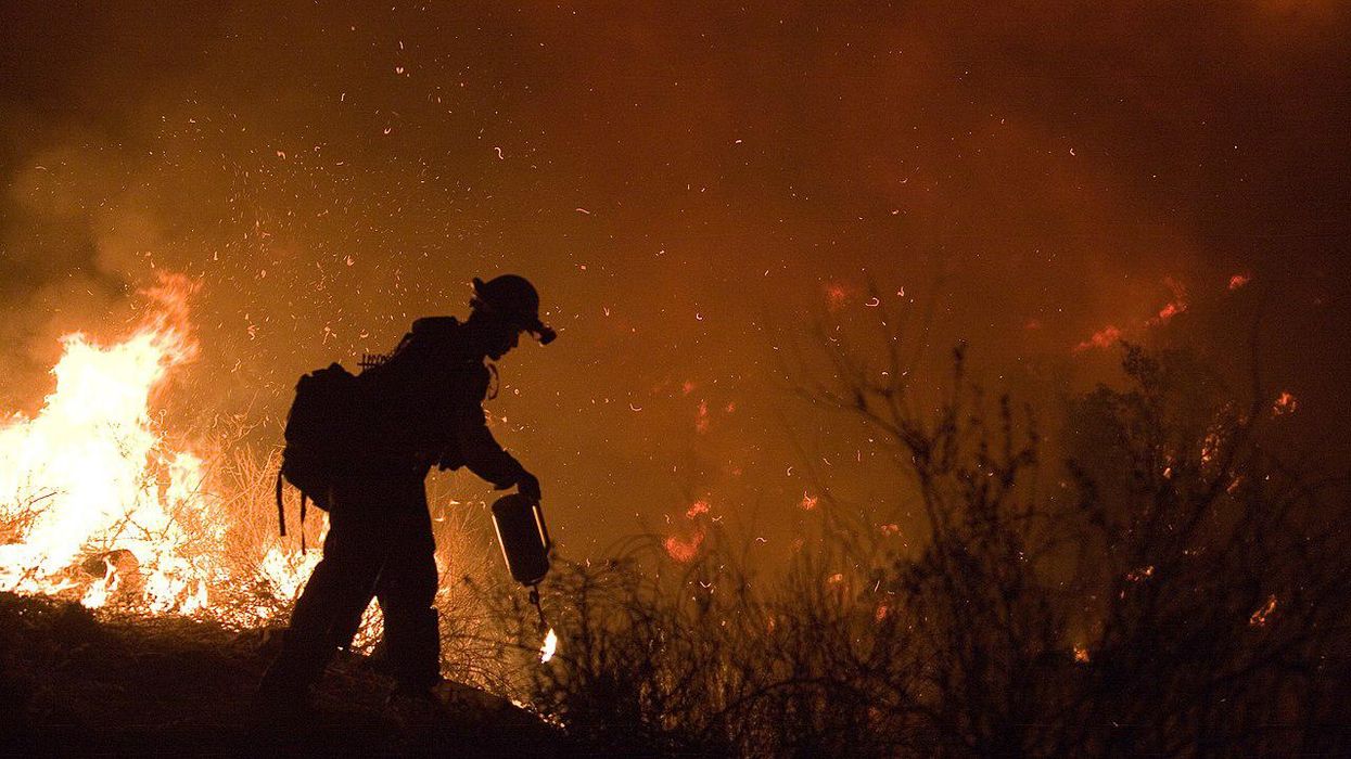 'Throwing cups of water at a raging inferno': UN study says Earth could warm 2.9C (5.2F) by 2100