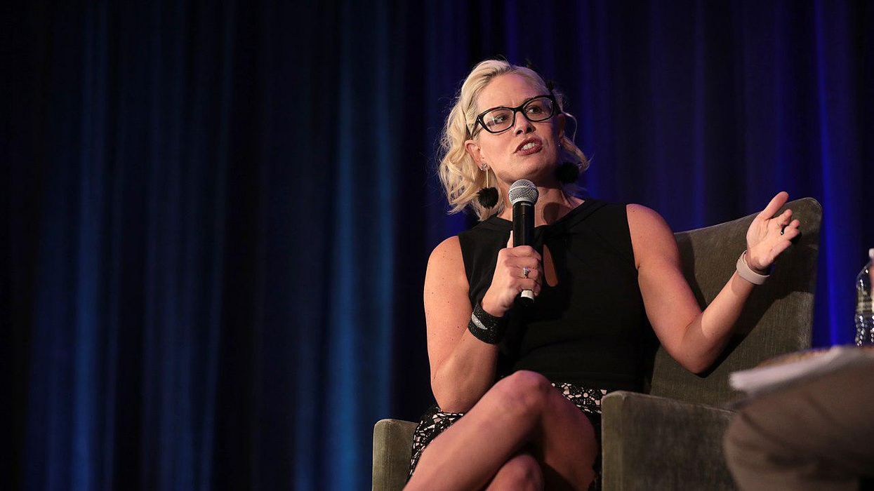 Progressives slam Kyrsten Sinema for infrastructure package 'watered down' by Exxon lobbying influence