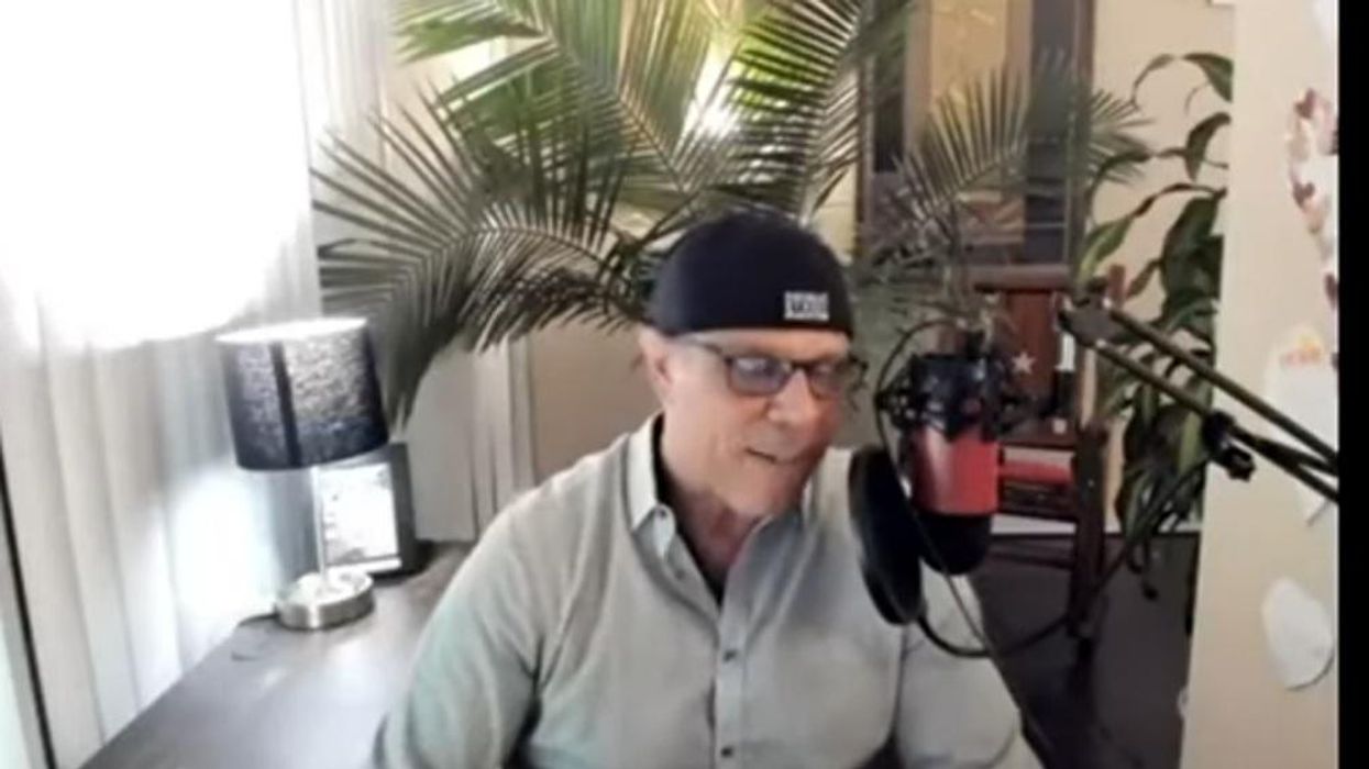 A QAnoner wielding a tomahawk is now crashing school board meetings