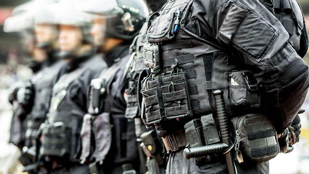 Progressive lawmakers push Biden to stop arming cops with military weaponry