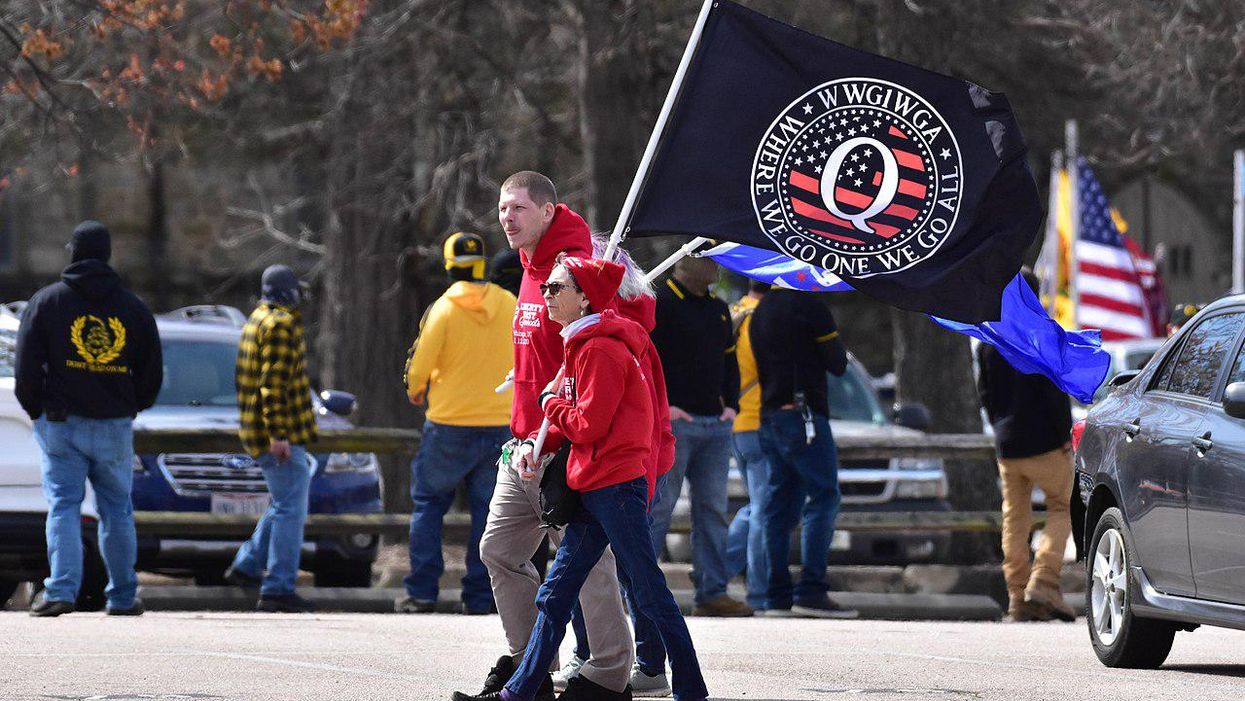 QAnon 'nut jobs' are 'intercepting' migrant children at the border to indoctrinate them: report