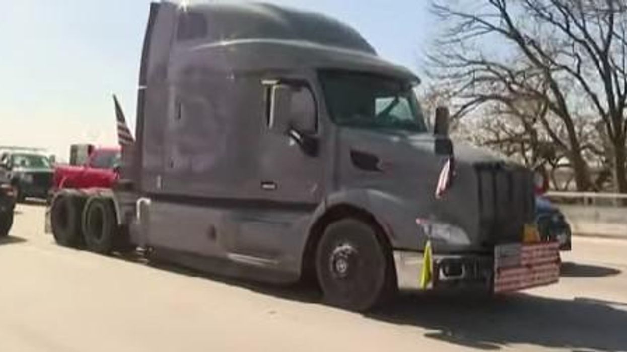 Right-wing people's convoy caught on video assaulting motorcyclist