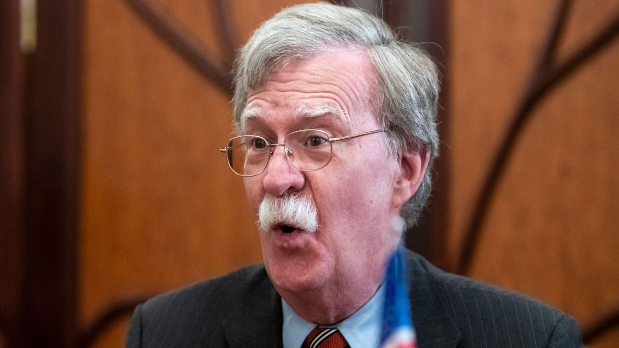 John Bolton defends the invasion of Iraq while dodging questions about his CNN coup confession