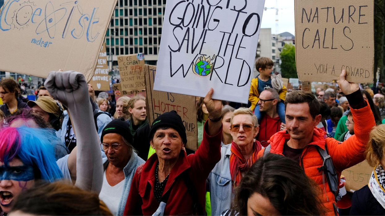 'Not yet defeated': Thousands march outside UN climate summit