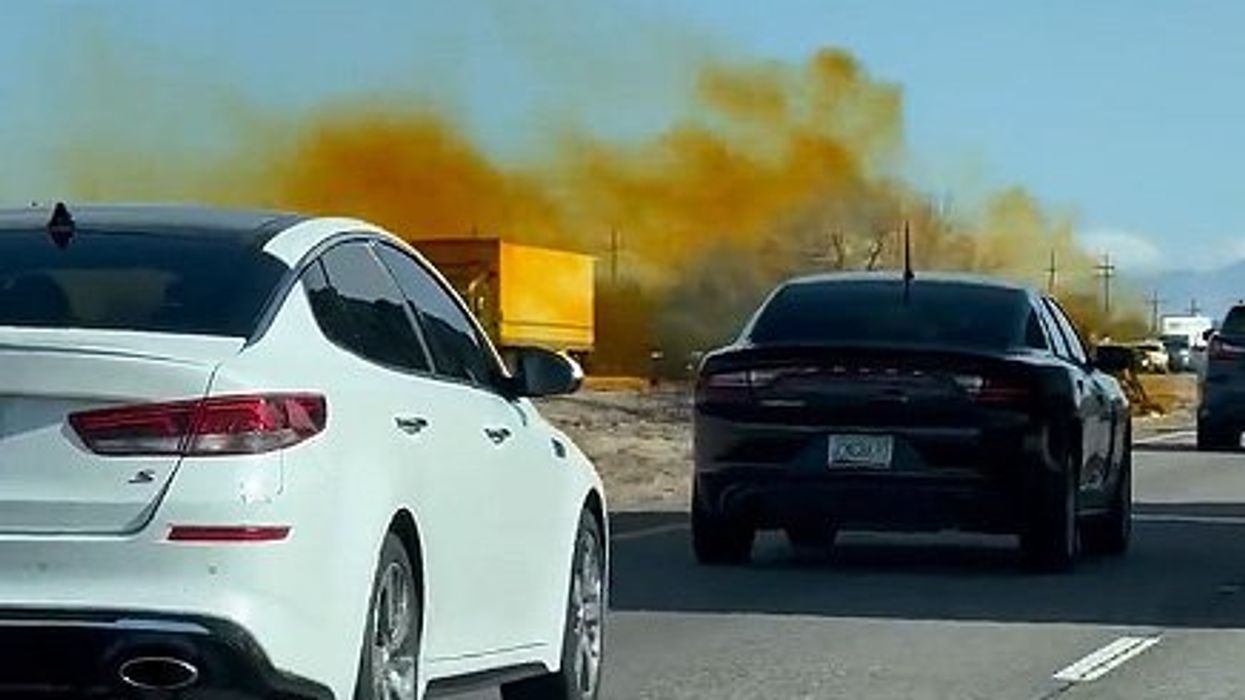 Arizona officials shut down busy interstate following crash of truck carrying liquid nitric acid