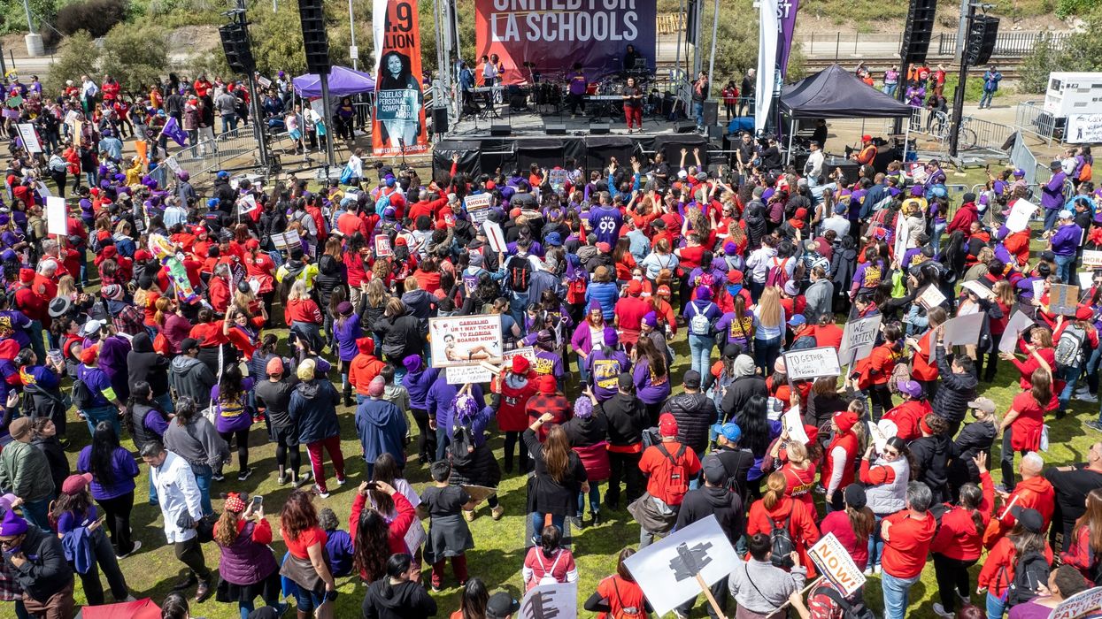 LA schools' lowest-paid workers walk out with teachers by their side