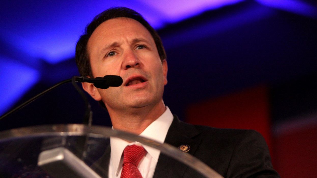 Governor urges new university national anthem policy to strip athletes’ scholarships
