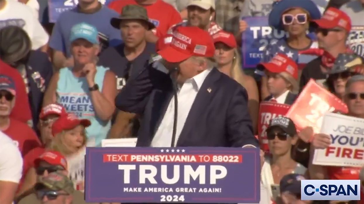 See it: Blood-stained Trump whisked off stage by Secret Service after apparent gunshots at rally